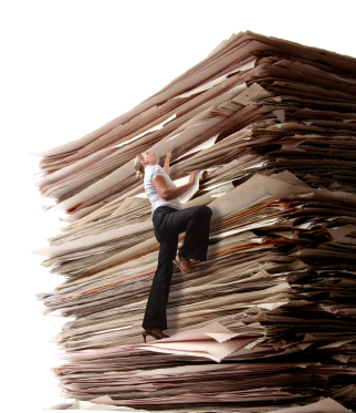 Business Woman Climbing a Pile of Files Business Woman Climbing a Pile of Files